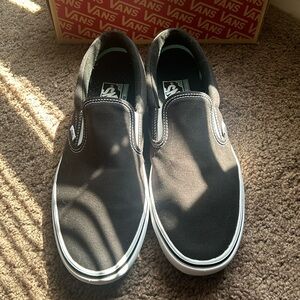 BLACK VANS classic slip on , size 10 woman’s . never worn